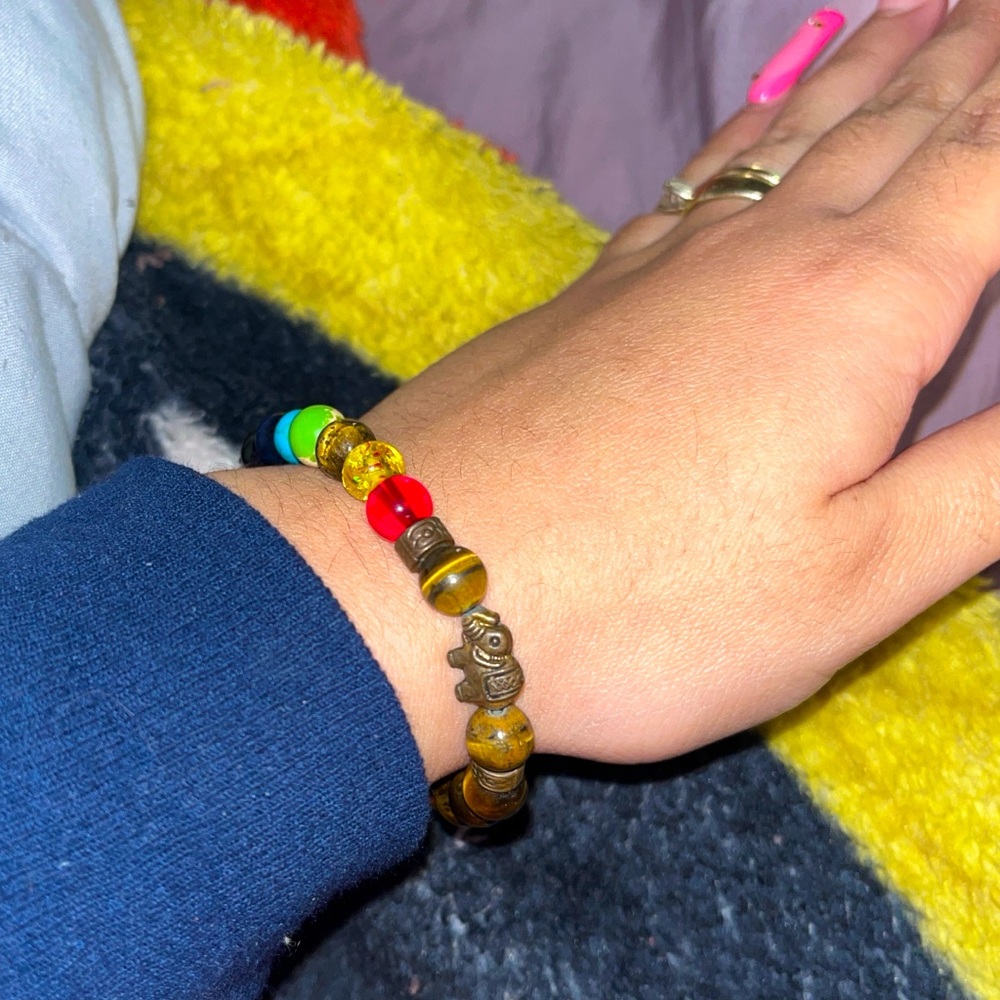 Multicolored beaded bracelet with tiger eye, turquoise, and amethyst beads